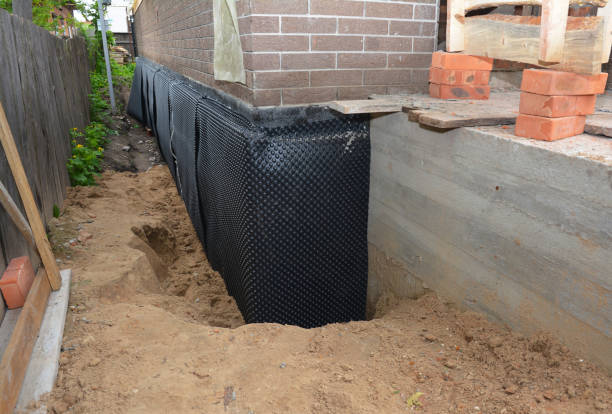 SJ Waterproofing Pros technician performing targeted Foundation Crack Repair assessment in Sunbury, OH